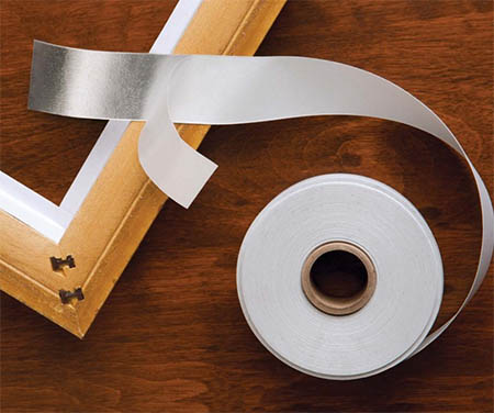 Repairing tears in paper with PEL Tengu Japanese Paper Tape 